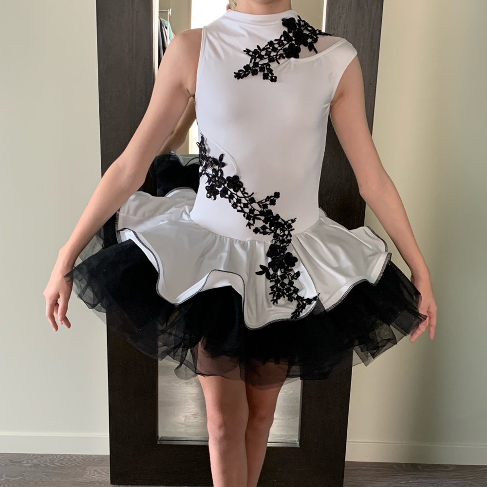 Ballet dance costume in white and black satin with big tutu. Very dramatic!